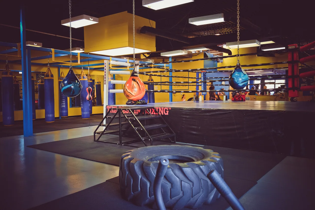 Bring It Back Boxing gym floor, ring, and training equipment