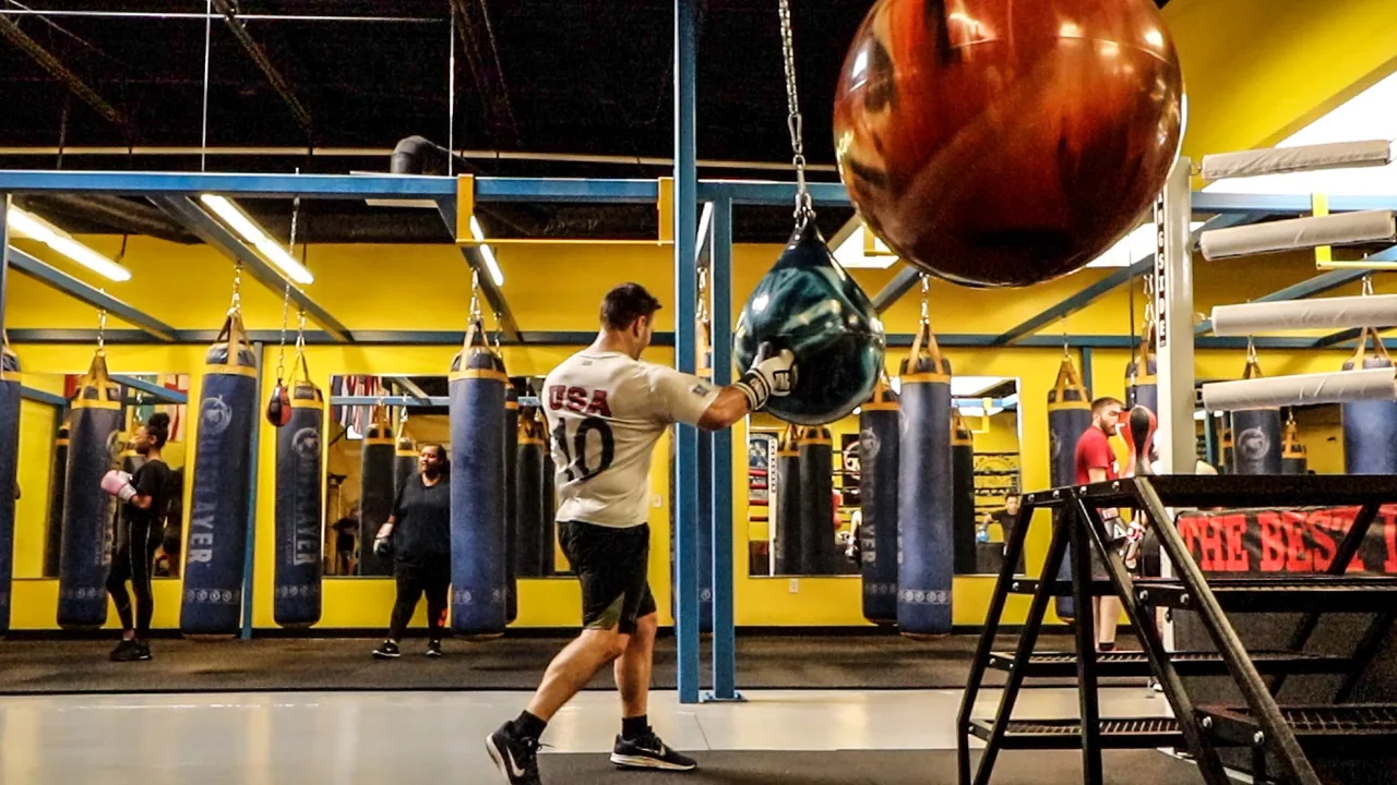 Members training across the Bring It Back Boxing gym floor